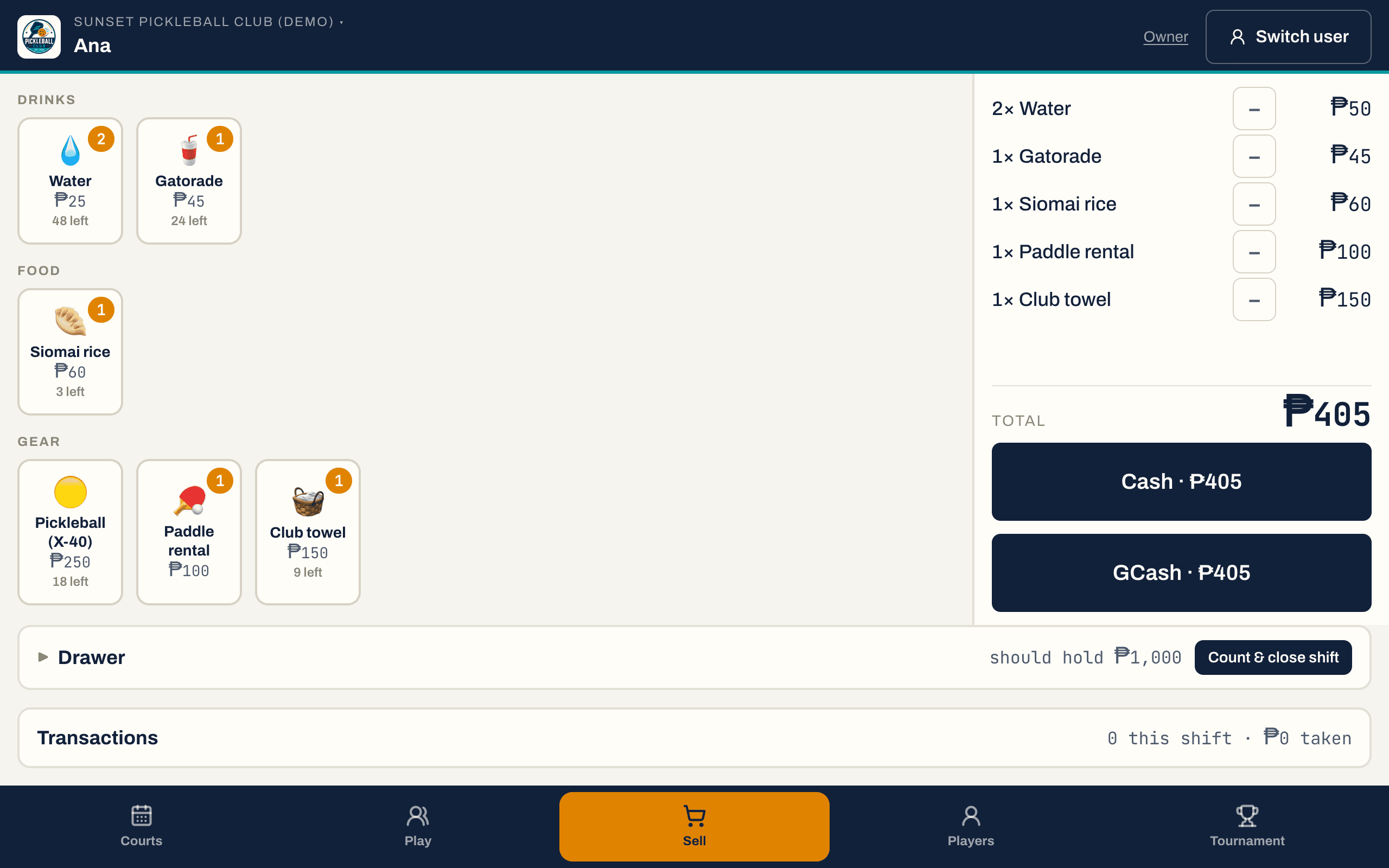 The DinkDesk cashier: product tiles by category with prices and stock left, and the drawer total along the bottom